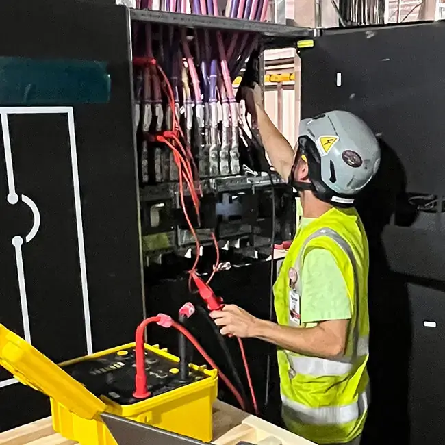 engineer performing cable testing services