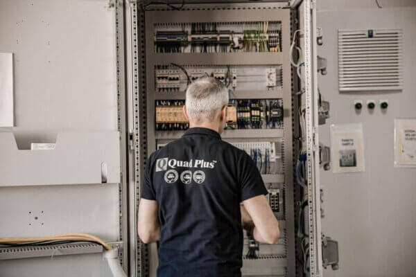 technician performing control systems integration work