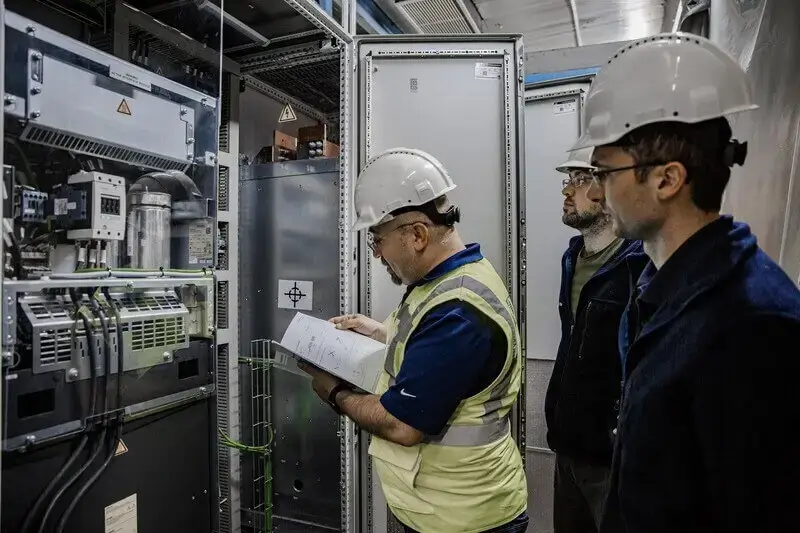 engineers reviewing control systems integration setup