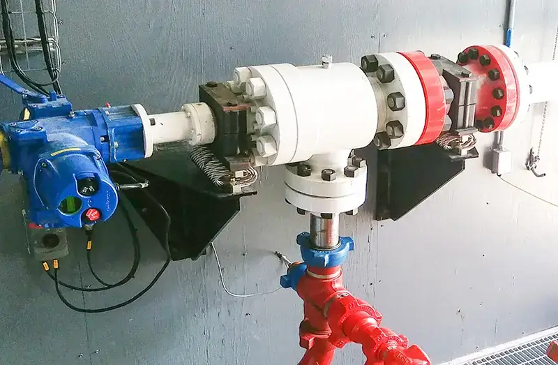 electrically activated choke for large pump test stands
