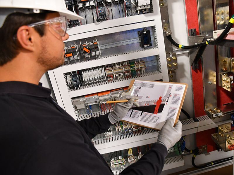 machine safety specialists inspect control panel safety