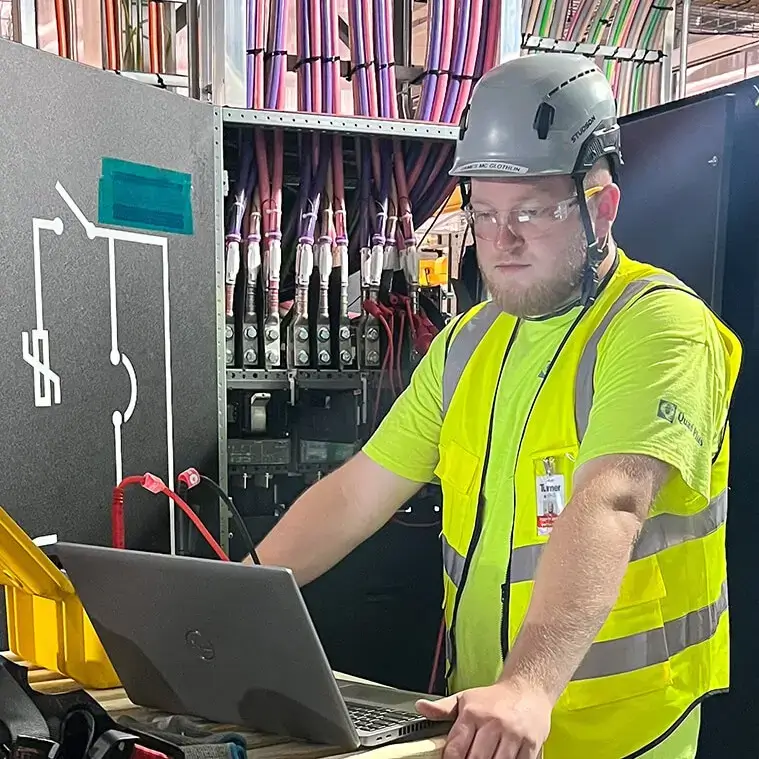 engineer is conducting cable testing services