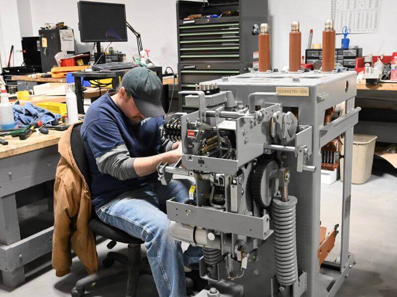 signs of a bad circuit breaker and when to seek repair 3 technician repairing equipment showing signs of a bad circuit breaker